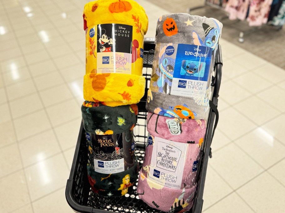 four disney halloween print throw blankets in black shopping cart