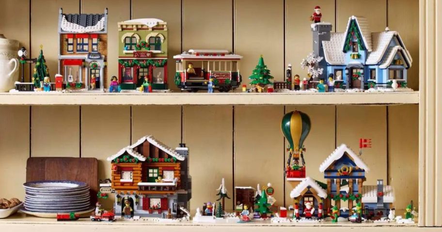 A cabinet filled with LEGO Christmas Sets