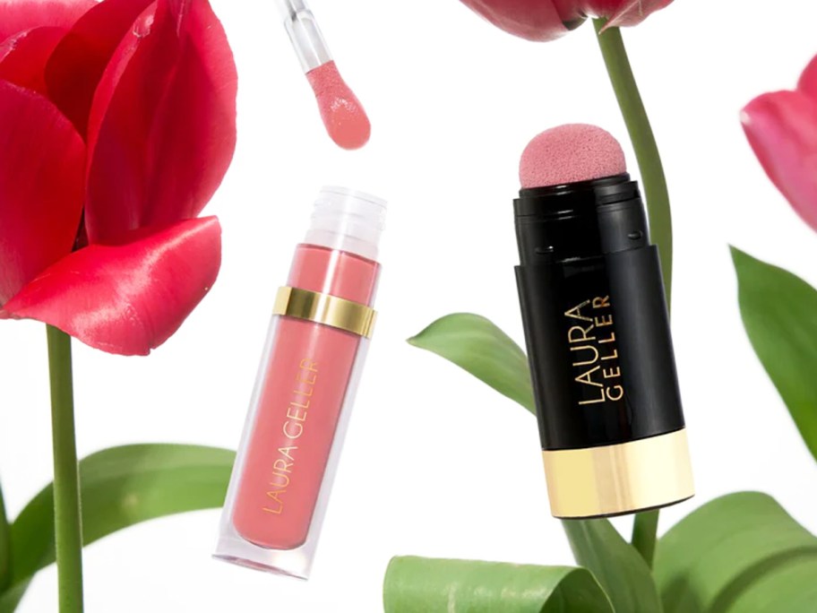 pink laura geller lip gloss and blush set near flowers