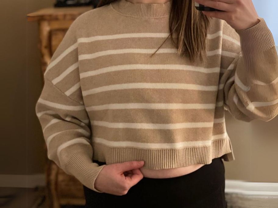 woman wearing Merokeety Women's Long Sleeve Striped Crop Sweater