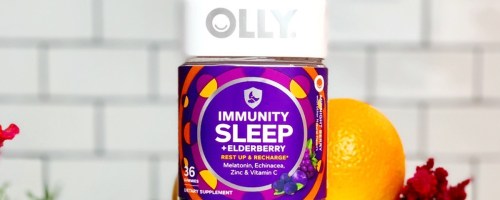 bottle of OLLY Immunity Sleep near oranges in kitchen