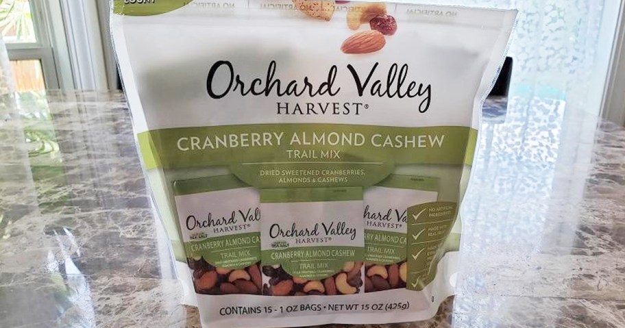 white and green bag of Orchard Valley Harvest Cranberry Almond Cashew Trail Mix on counter