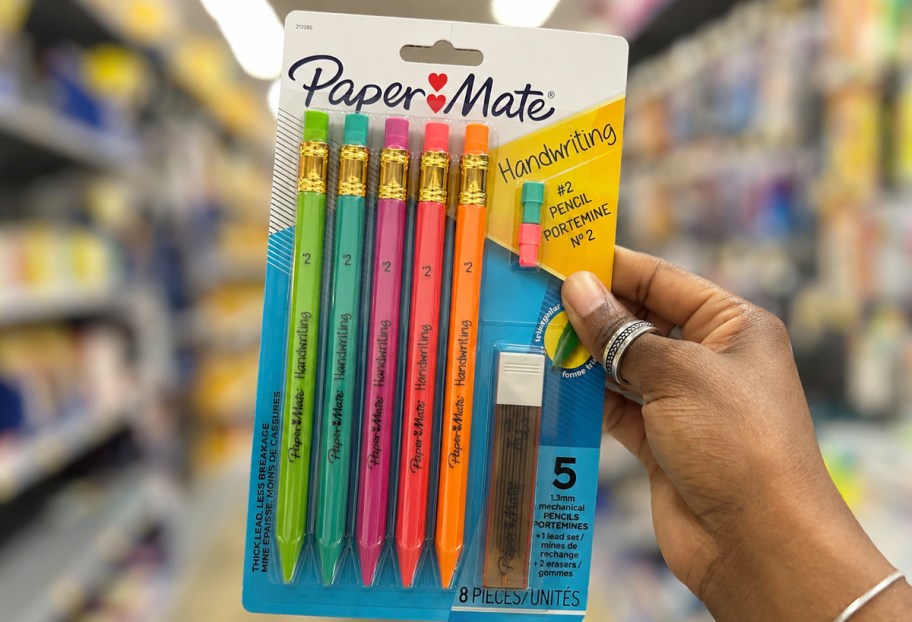 hand holding up a pack of Paper-Mate Triangular Mechanical Pencils in store