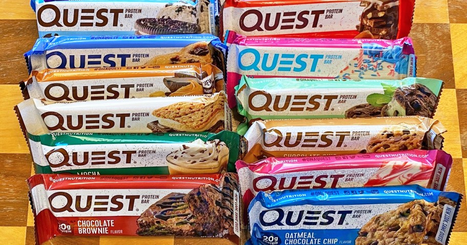 variety of quest protein bars on cutting board