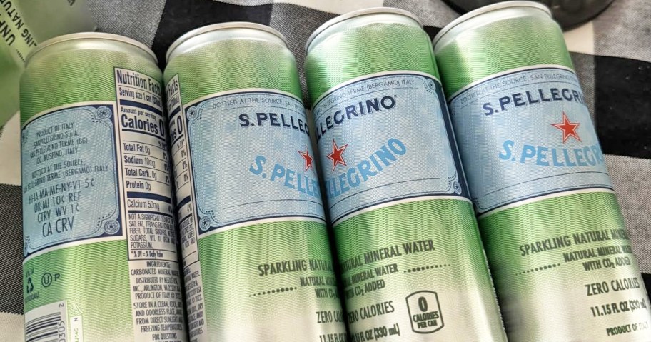 four green cans of S.Pellegrino Sparkling Natural Mineral Water