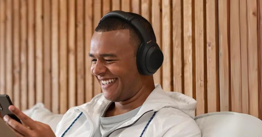 man wearing Sony Wireless Premium Noise Canceling Headphones