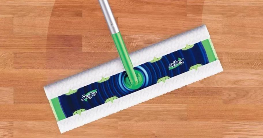 A Swiffer XL mop head on a hardwood floor