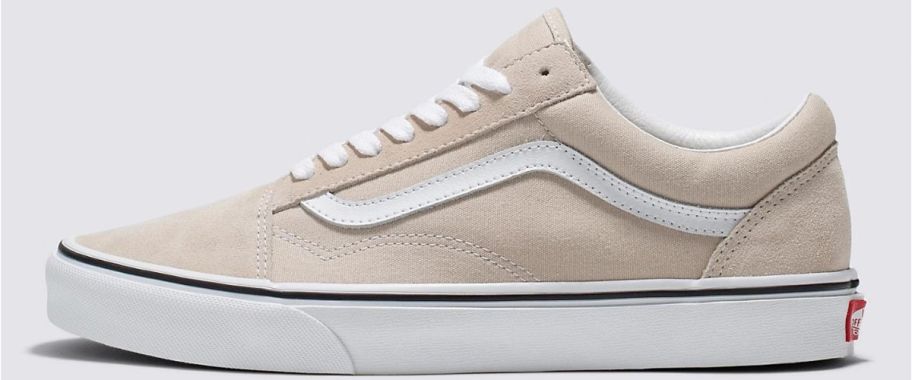 A Vans Old Skool Shoe in tan and white