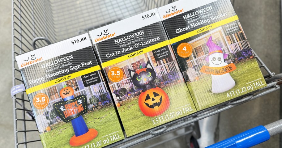 boxes of halloween inflatables in shopping cart