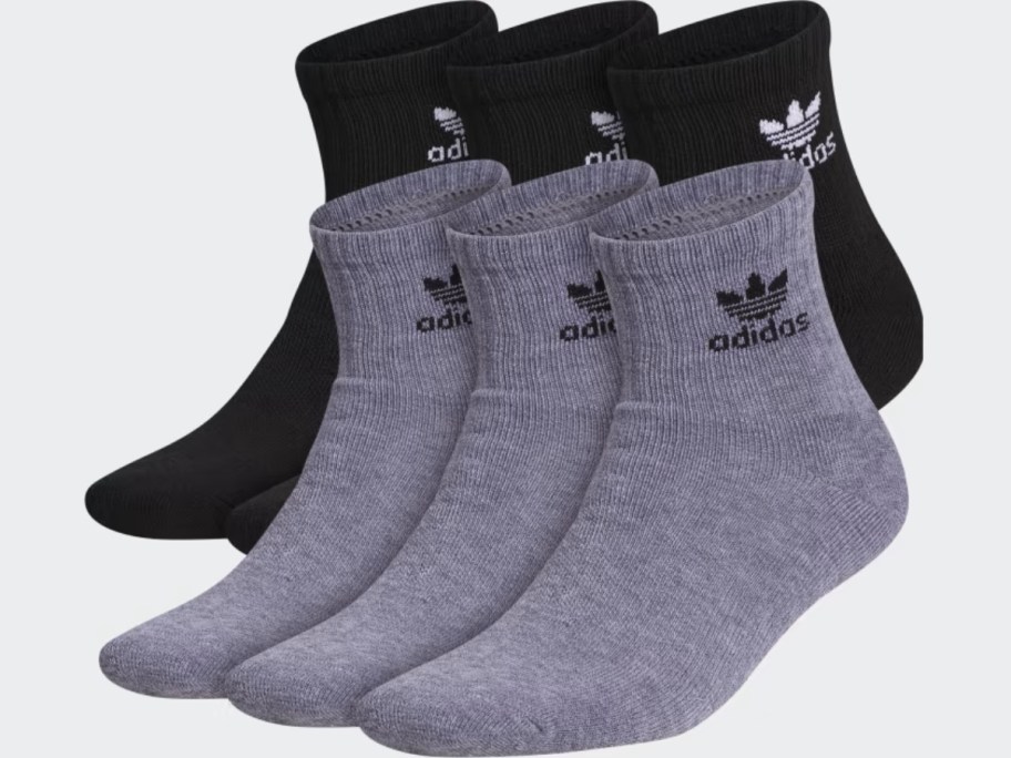 6 single adidas socks in grey and black with the trefoil logo on the side