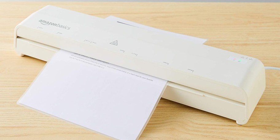 white laminator on table 