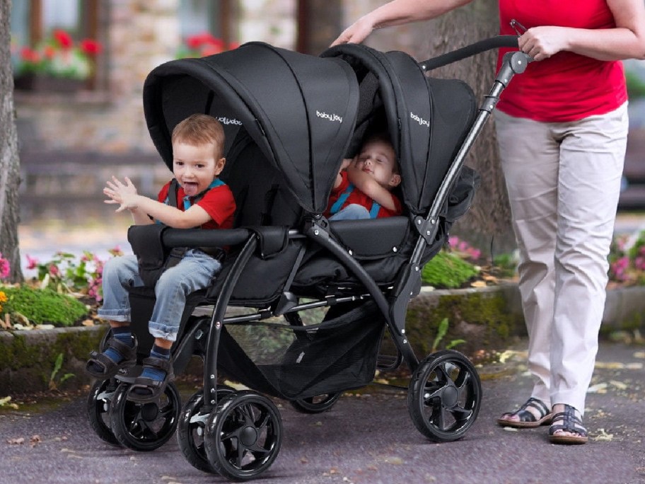 double stroller with kiddos inside