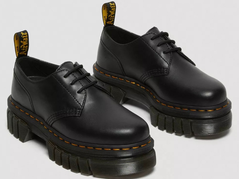 pair of dr martens black shoes 