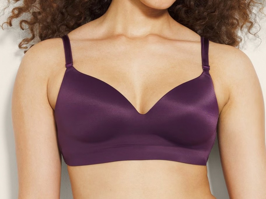 woman wearing purple bra