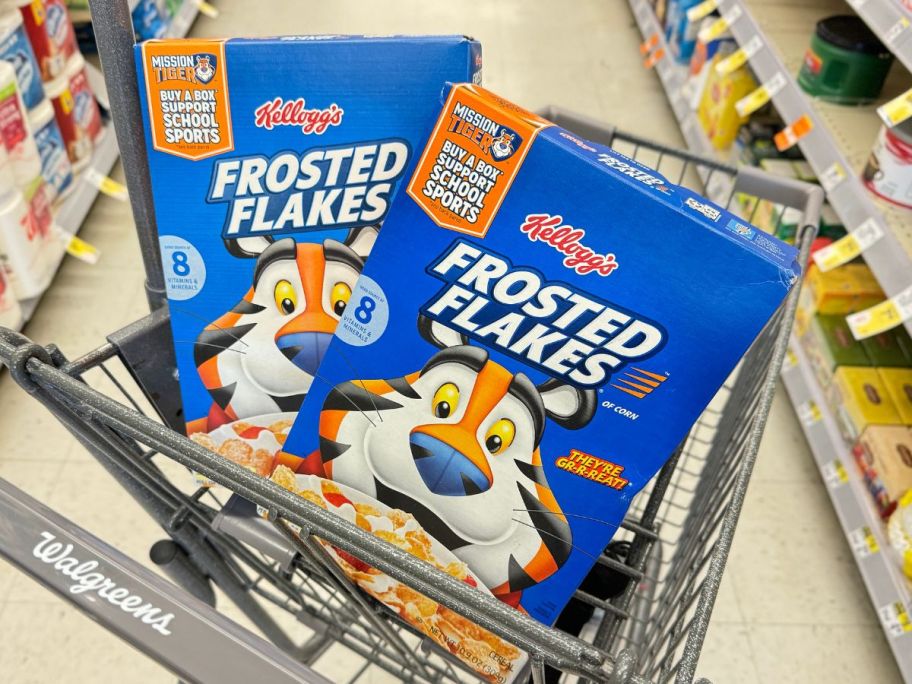 two boxes of frosted flakes in cart in store