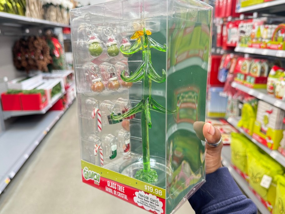 grinch glass tree with 13 pieces inside of the store