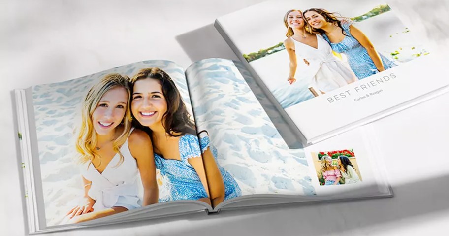 photobook with two best friends open on table 