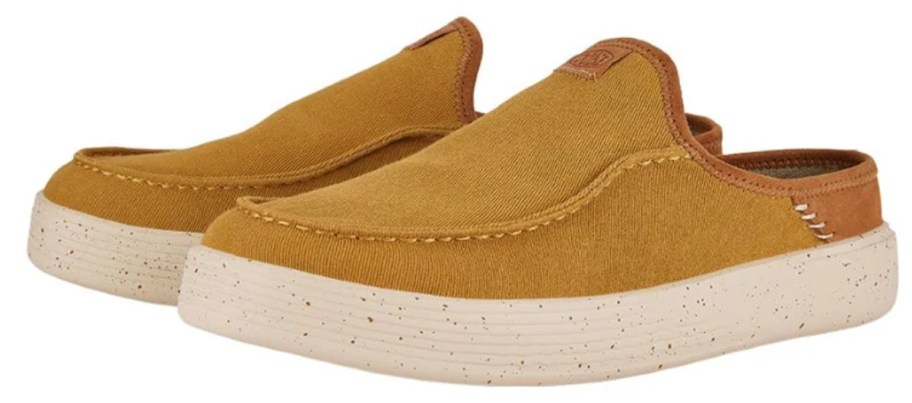 mens' HEYDUDE slip in open heel shoes in a tan color