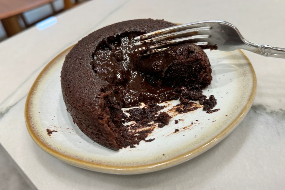 fork cutting chocolate lava cake