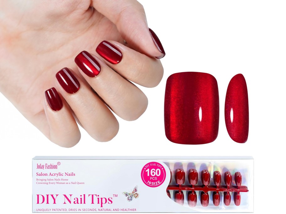 hand with red press on nails and jofay nail kit pack