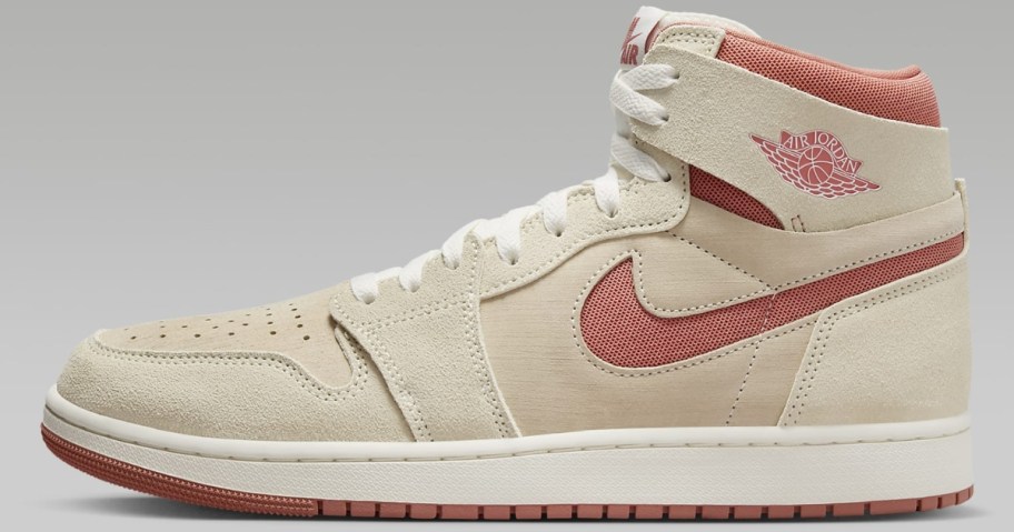 men's cream and white Nike Air Jordan mid shoes with pink accents