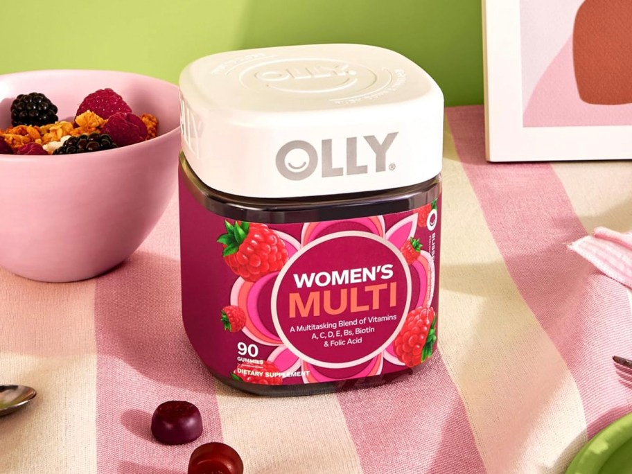 olly womens multivitamin bottle on table