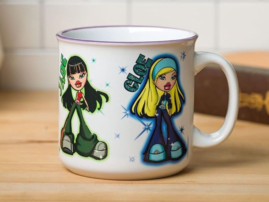 Silver Buffalo Bratz Dolls Ceramic Camper Mug 20oz on counter