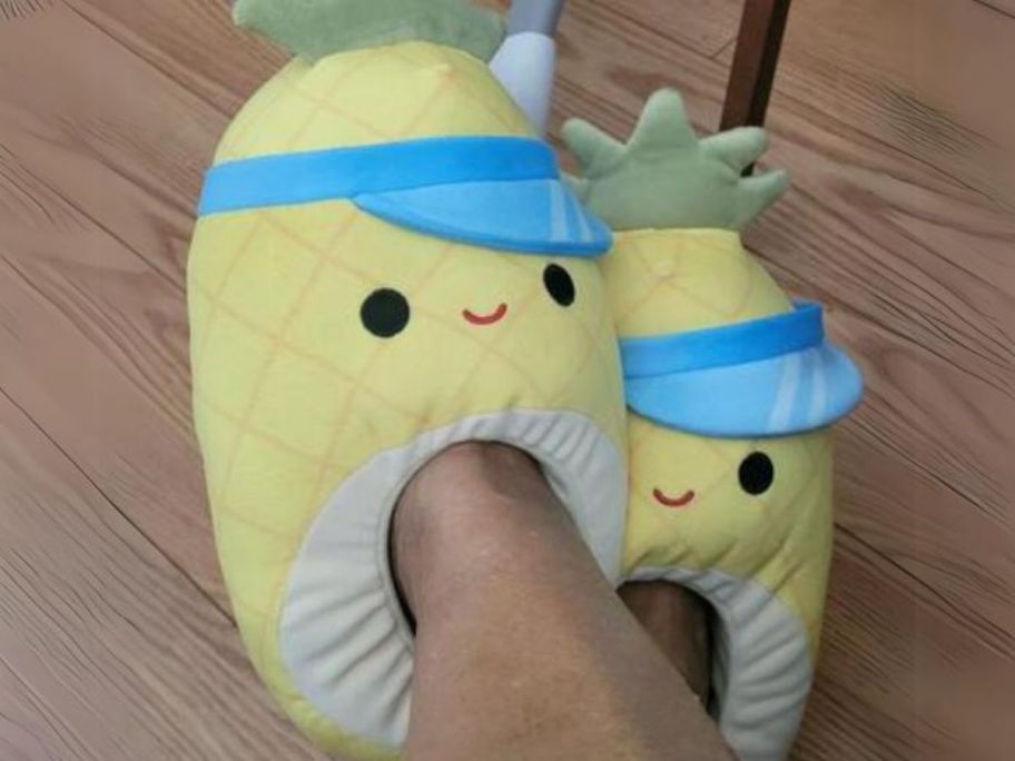 feet wearing squishmallows slippers