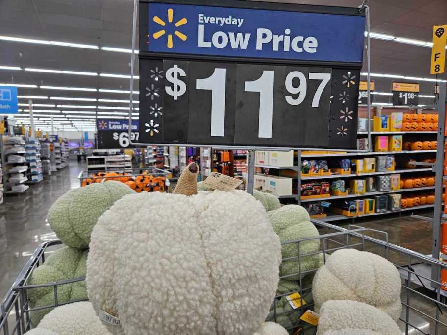 walmart bin with green and white pumpkin pillows