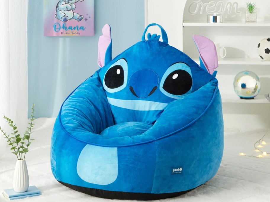 a Disney Stitch kid's plush bean bag chair in a bedroom