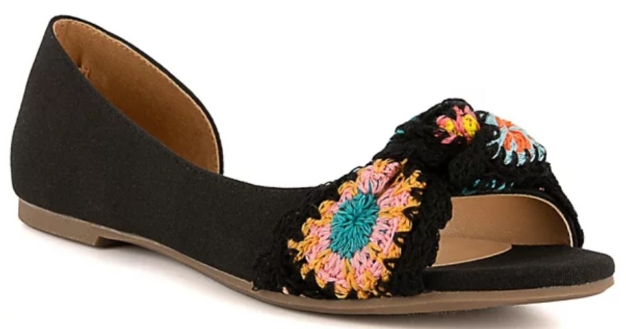 women's black side cut open flats with embroidered embellishments on the top