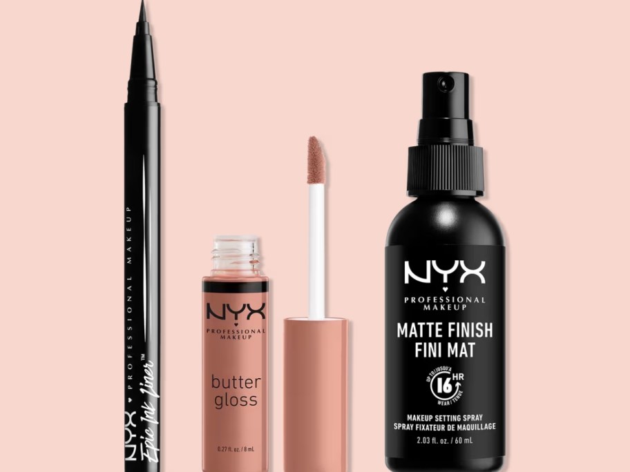 NYX eyeliner, lip balm and setting spray on a pink background