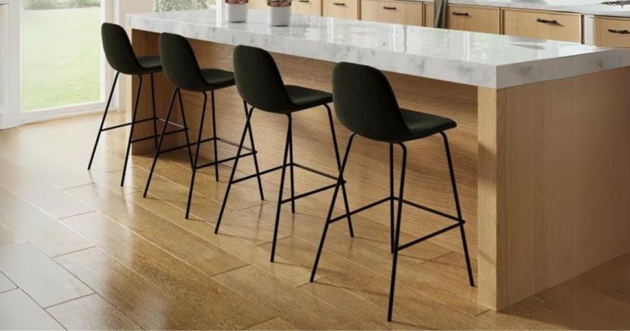 four AllModern Kody Upholstered Bar & Counter Stools at counter