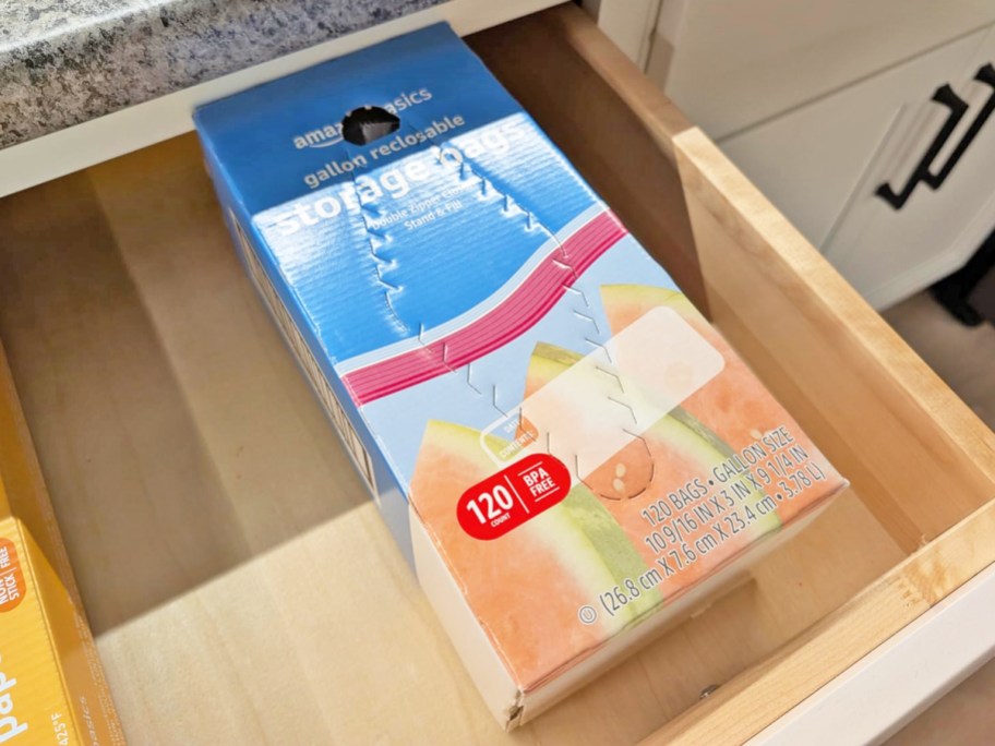 large box of Amazon Basics Gallon Food Storage Bags in kitchen drawer
