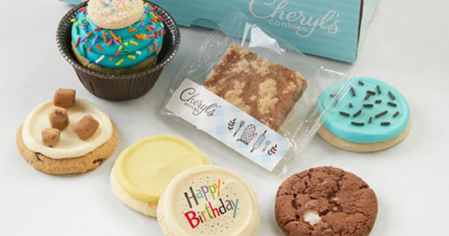 cookies and treats sitting outside blue cheryls cookies box