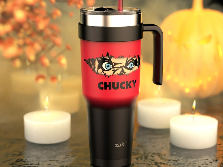 red and black chucky halloween tumbler on table