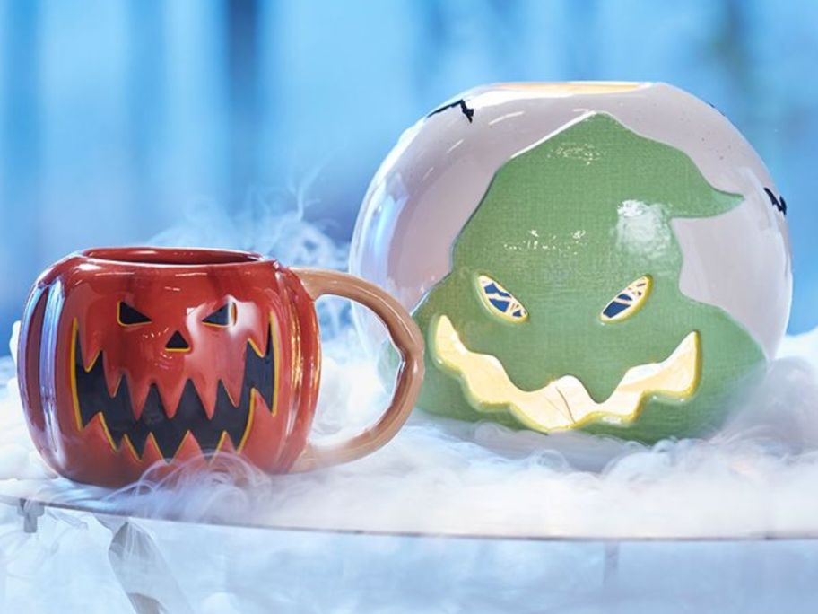 A Disney Pumpkin King Mug and Oogie Boogie Tealight Holder