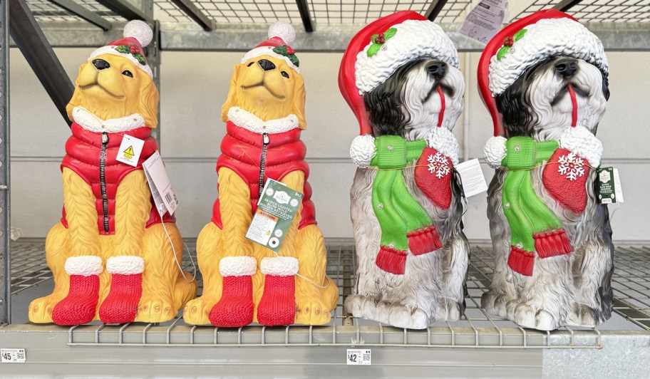 golden retriever and sheepdog blow molds on store shelf