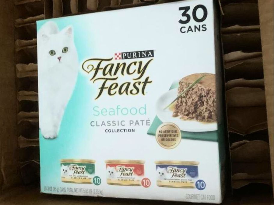 A box of Fancy Feast cat food cans