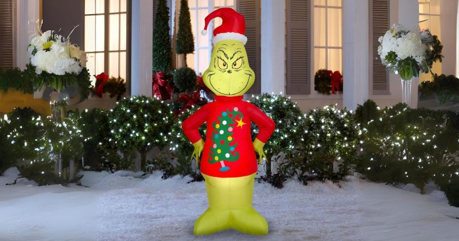 Grinch 6.5' LED Christmas Inflatable in front yard