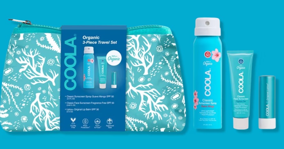 a Coola Classic Organic Suncare Travel Set with a zipper bag on a blue background