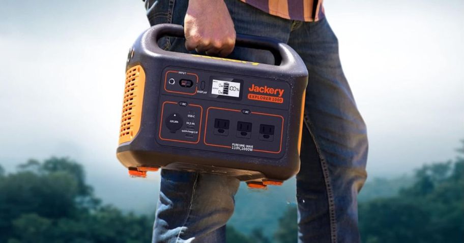 man carrying Jackery Explorer Portable Power Station