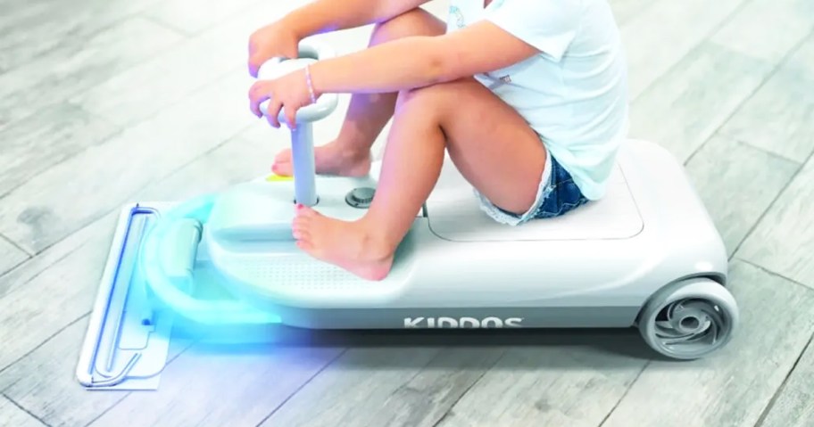 girl riding on electric cart with led headlights and mopping pad