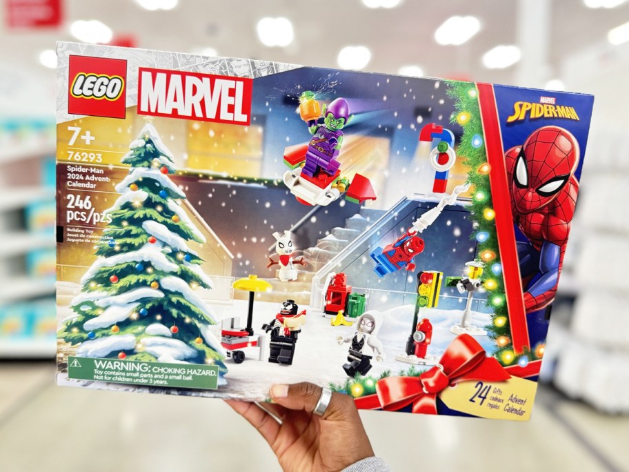 hand holding up a LEGO Marvel Spider-Man Advent Calendar