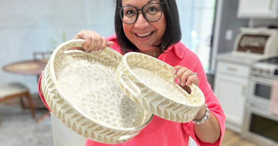 Woman holding a large and Small Capiz Turntable