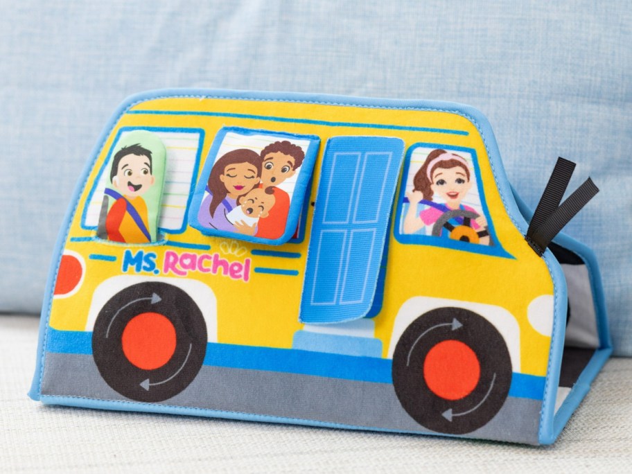 Mrs rachel the wheels on the bus toy displayed on the table