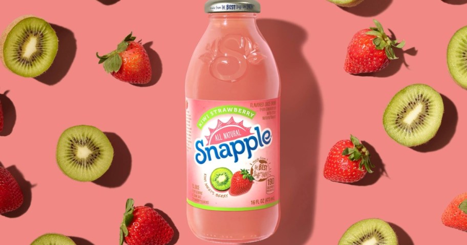snapple kiwi strawberry bottle against pink background