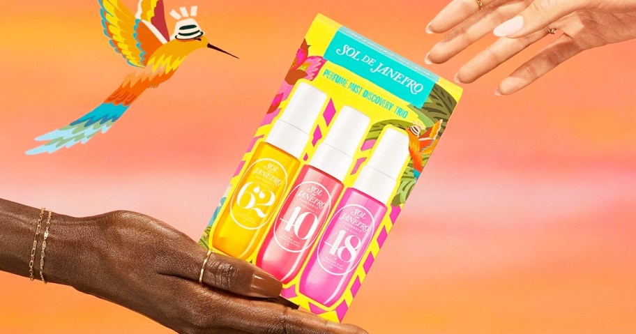 hands holding a Sol de Janeiro mist gift set