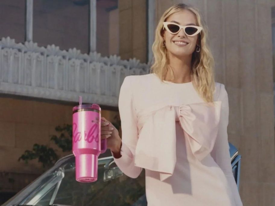 Woman holding a Pink Stanley Barbie Tumbler