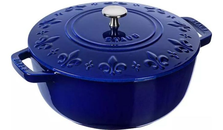 Staub blue enamel Dutch oven with scroll design on lid